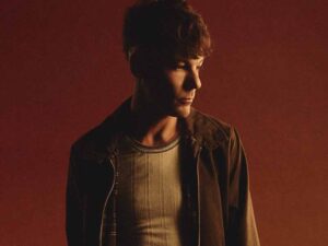 دانلود آهنگ Imposter از Louis Tomlinson با متن و ترجمه